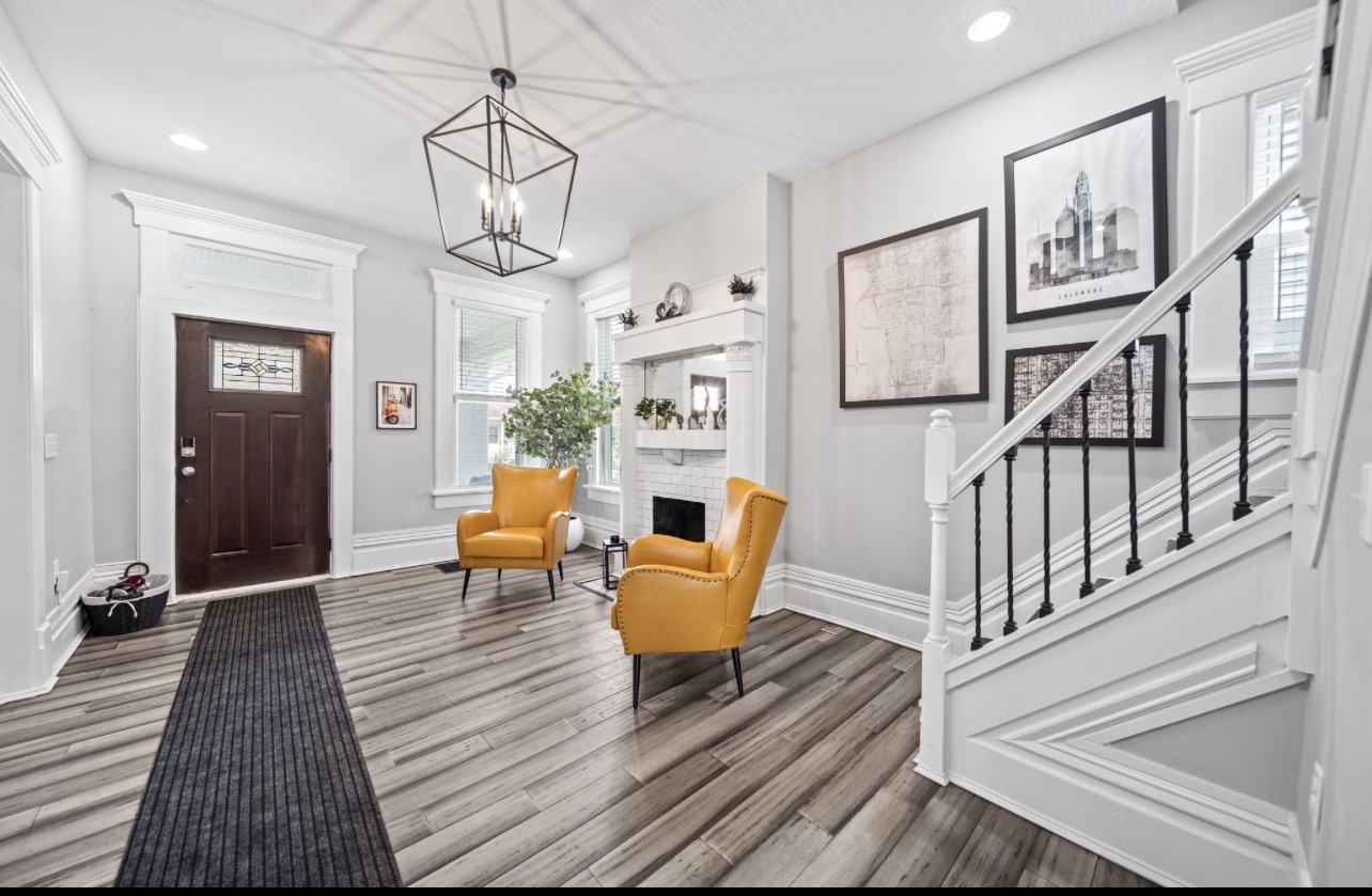 Historic entry foyer and staircase at The Oakwood Retreat